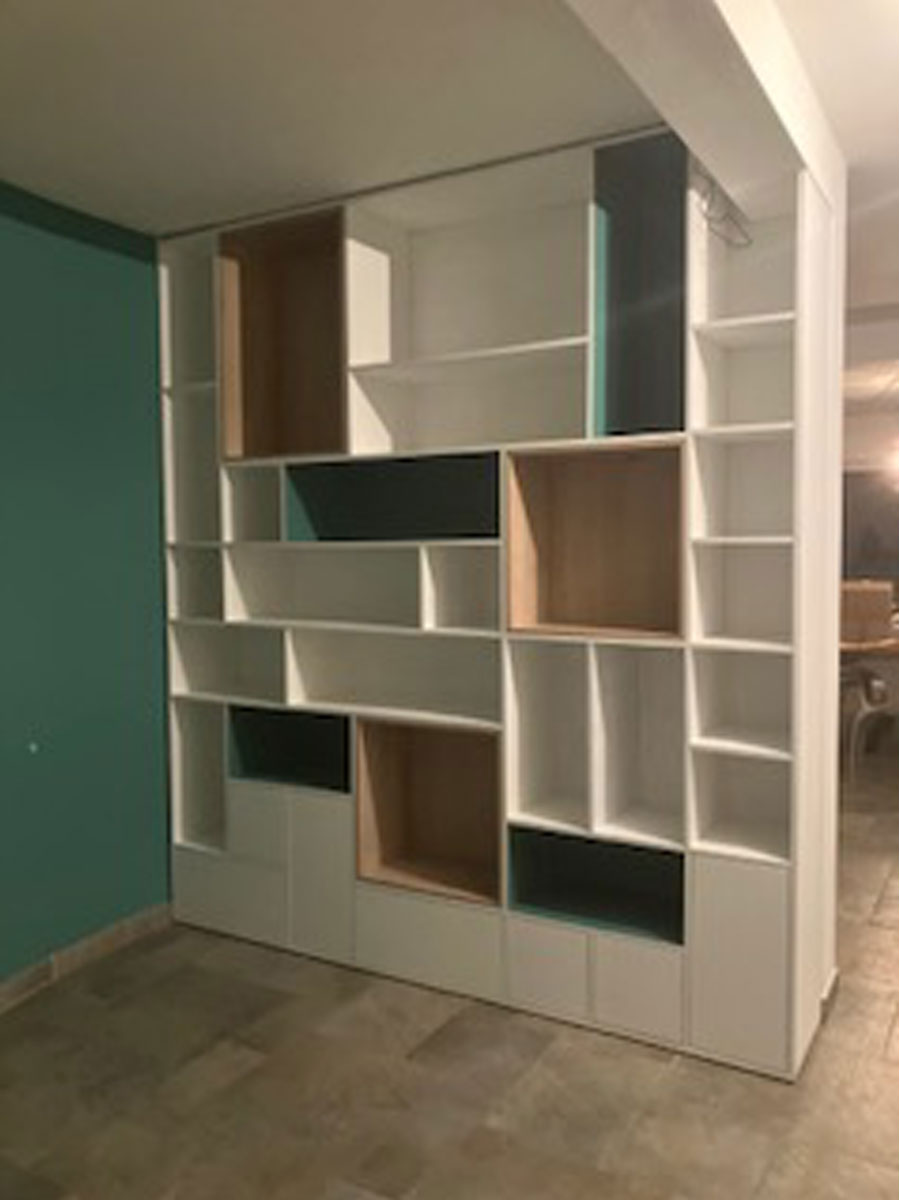 Bookcase designed by our agency and made to measure by our carpenter