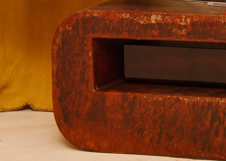 detail of a custom made tv cabinet in rusted metal