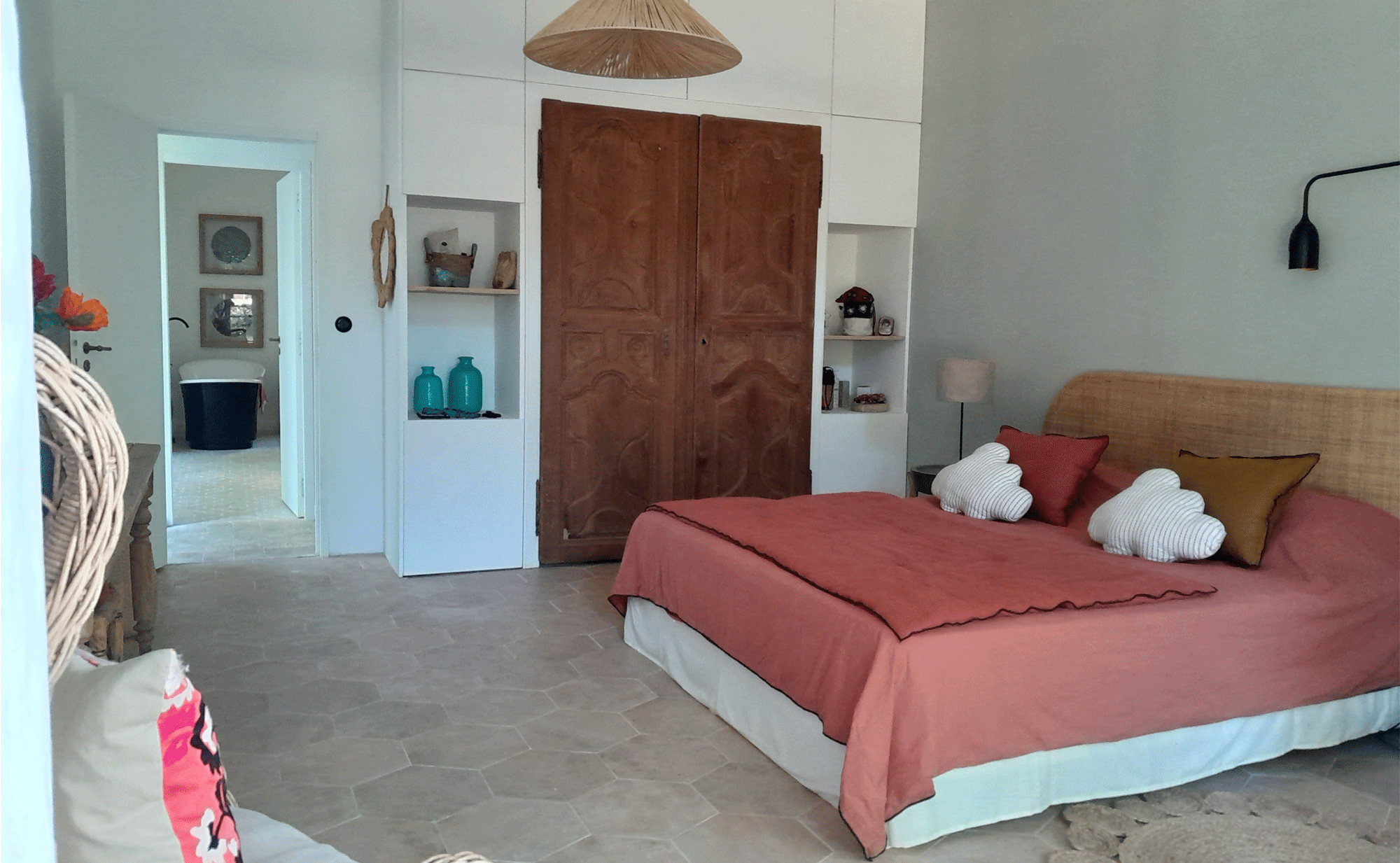 Custom-made dressing room consisting of an antique door and medium-density fiberboard cupboards