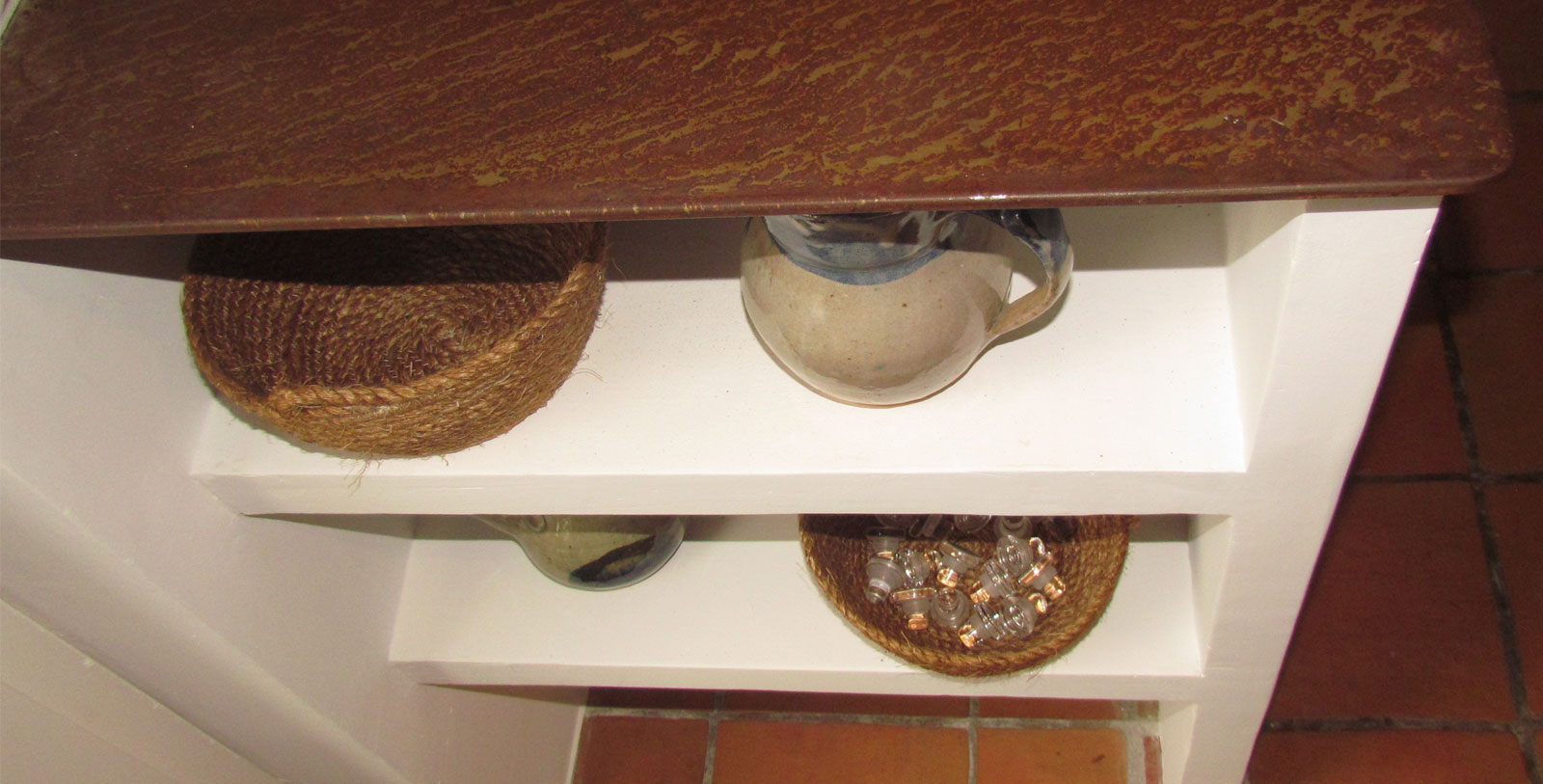 masonry shelves at the end of the worktop detail