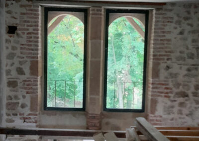 original stone and brick window towers